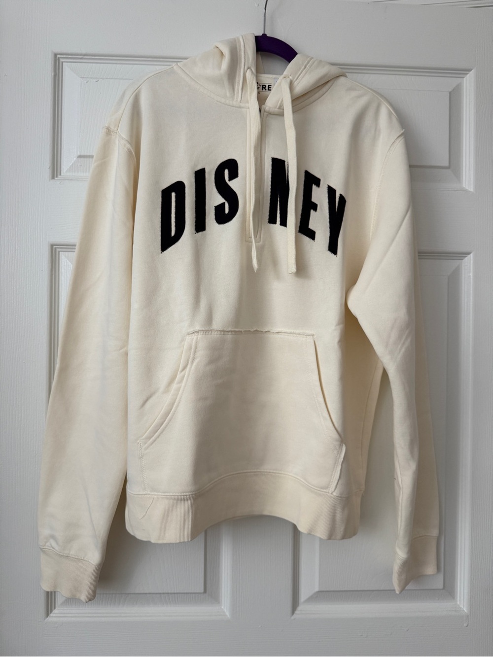 Disney Cream Hoodie with Black Logo